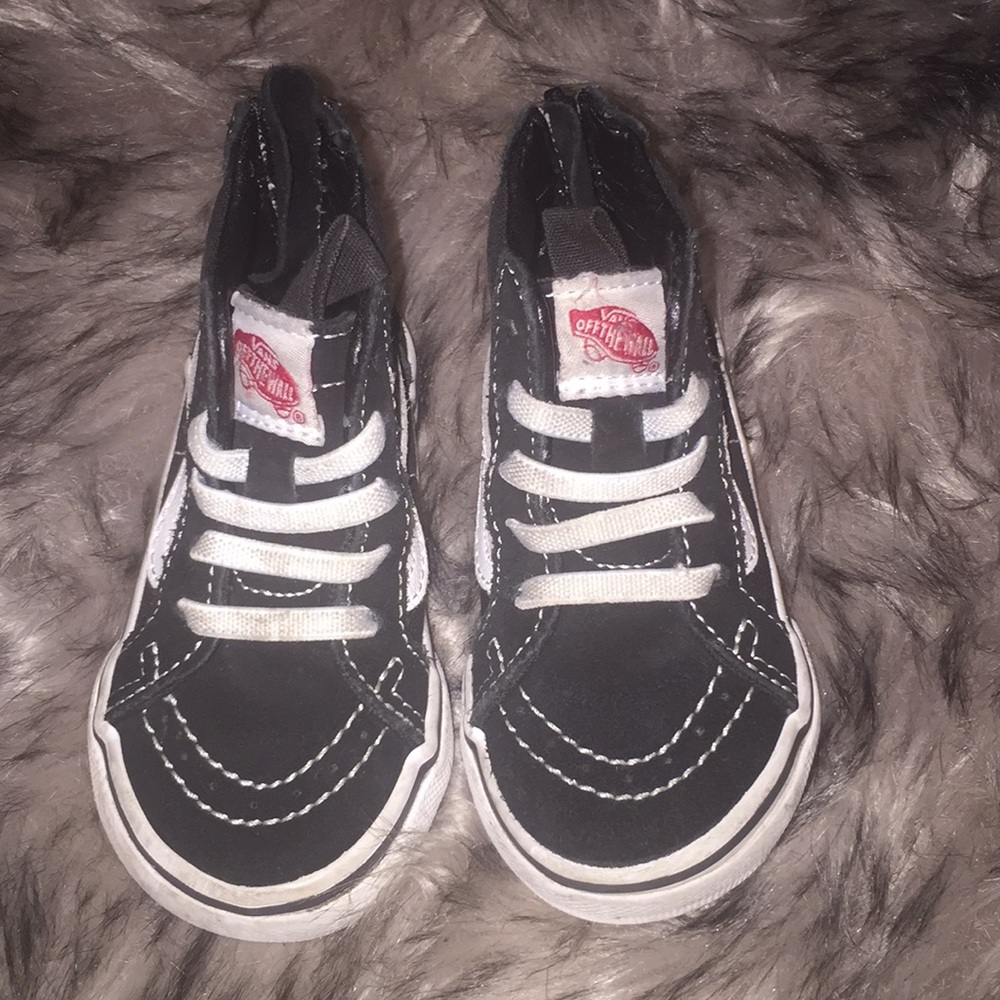 Black and white toddler high top vans